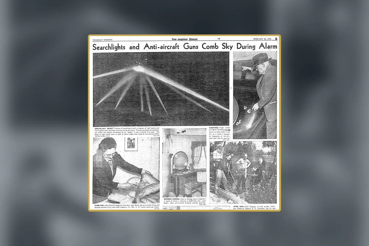 A Los Angeles Times page showing searchlights and anti-aircraft reporting