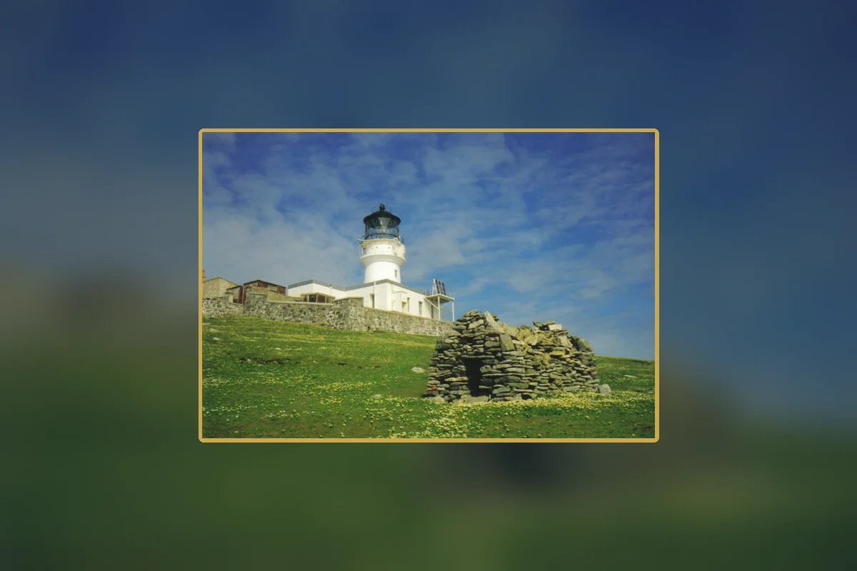 St Flannan's chapel ruins and the lighthouse on Eilean Mòr