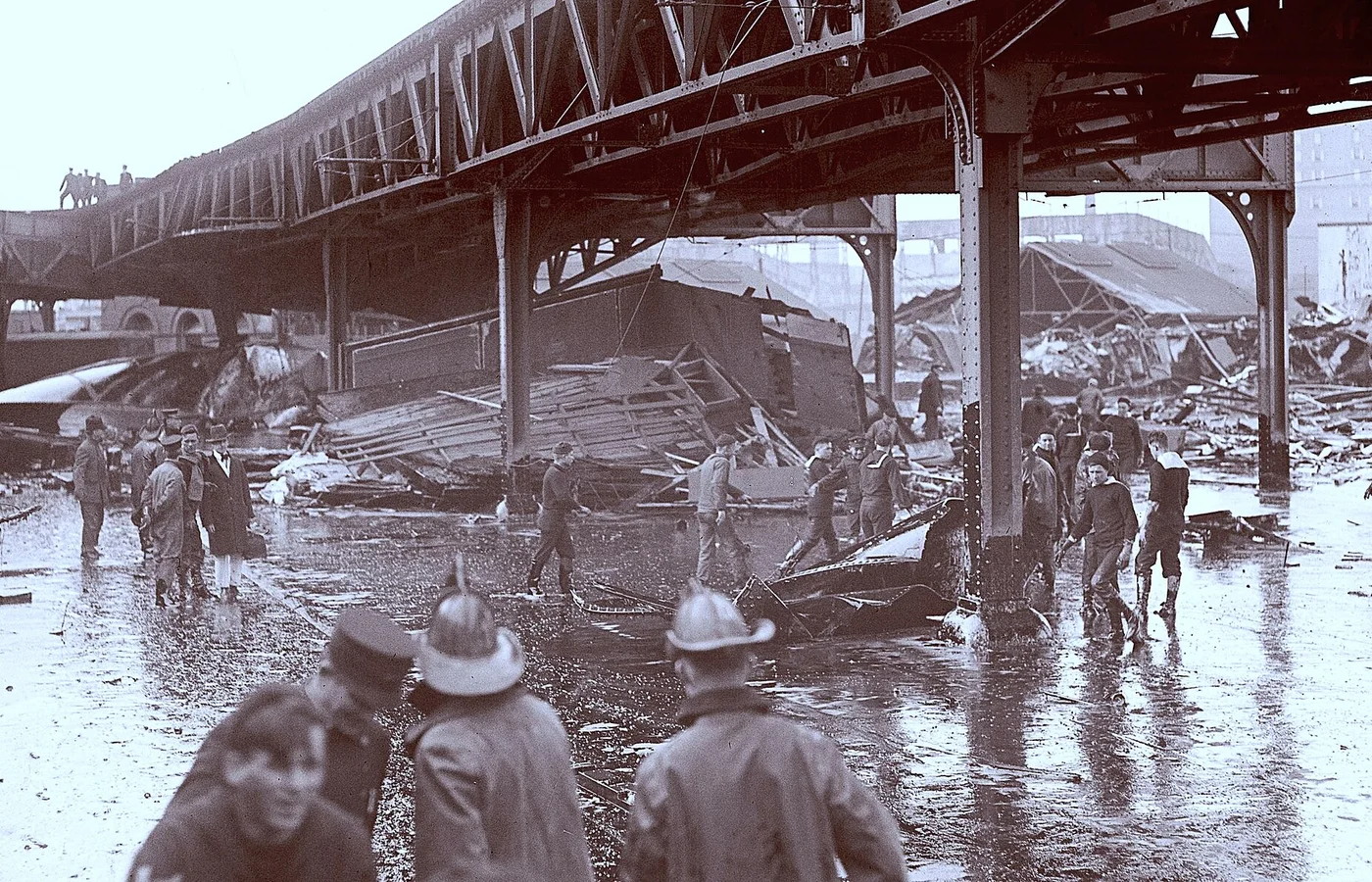 Wreckage beneath Boston's elevated railway after the Great Molasses Flood