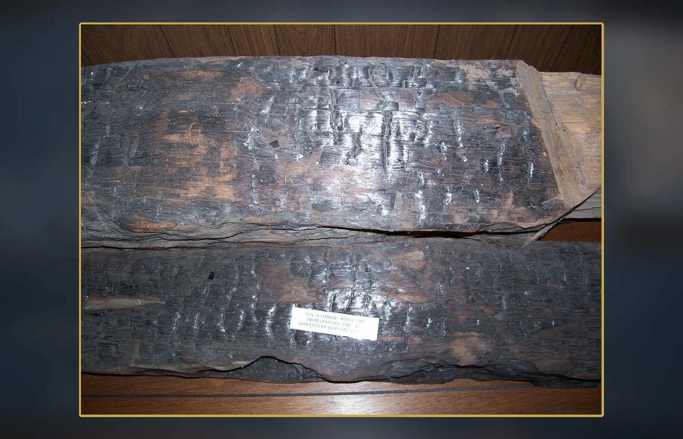 Lumber that survived the Peshtigo Fire, evidence of the town's fuel-rich industrial landscape